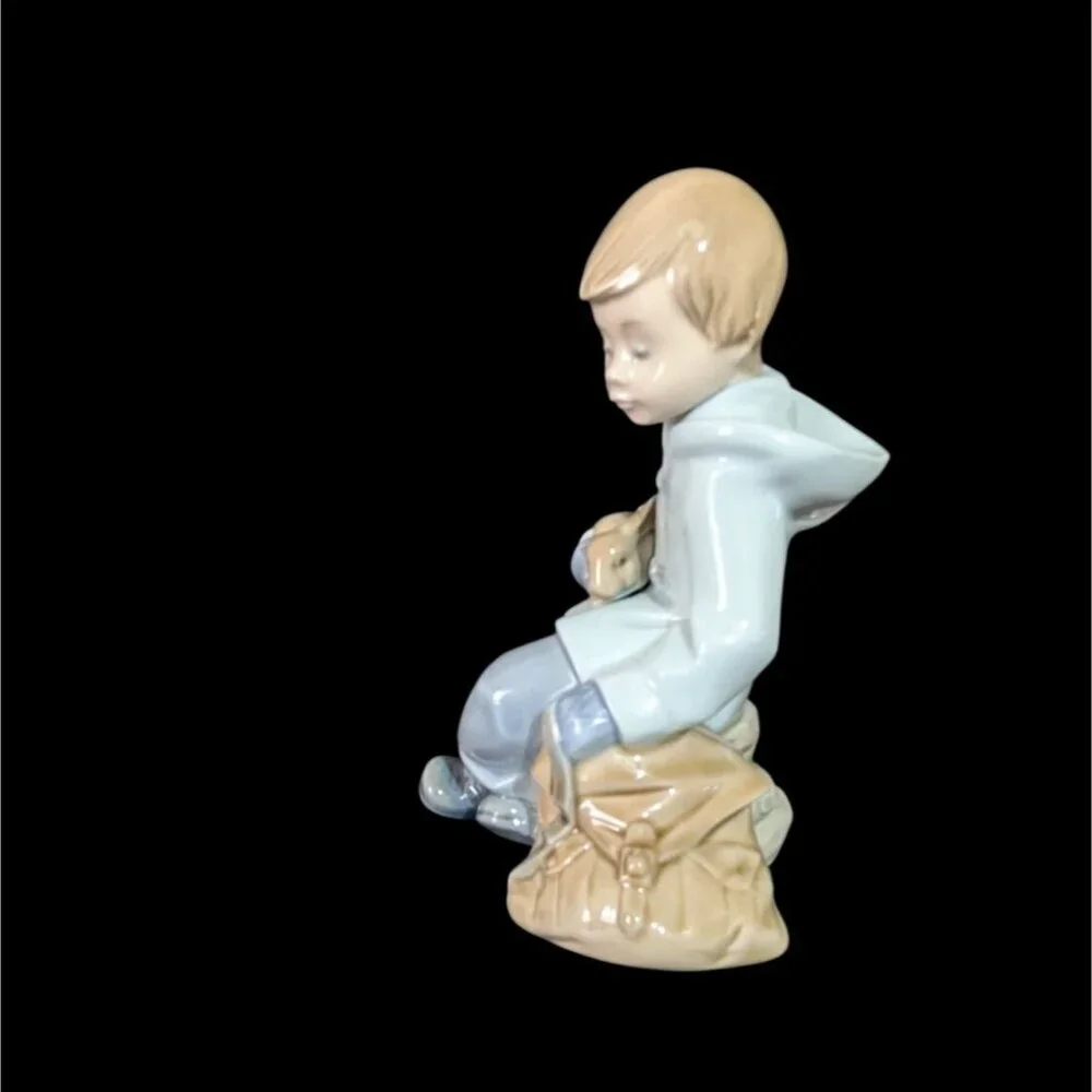 NAO by Lladro 1987 Figurine Boy Sitting on Bag Holding Bunny Rabbit‎ Vintage